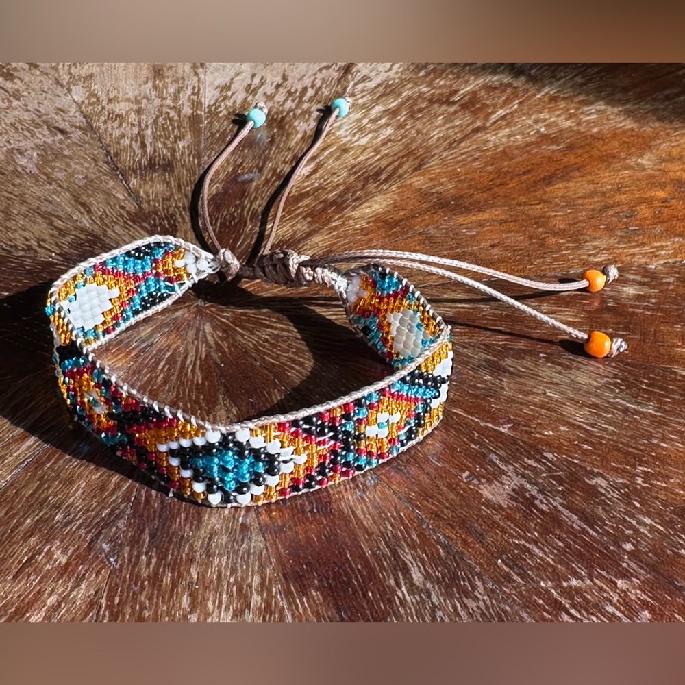 Cute little beaded southwestern Indian print pull tie bracelet adjustable 6-8”